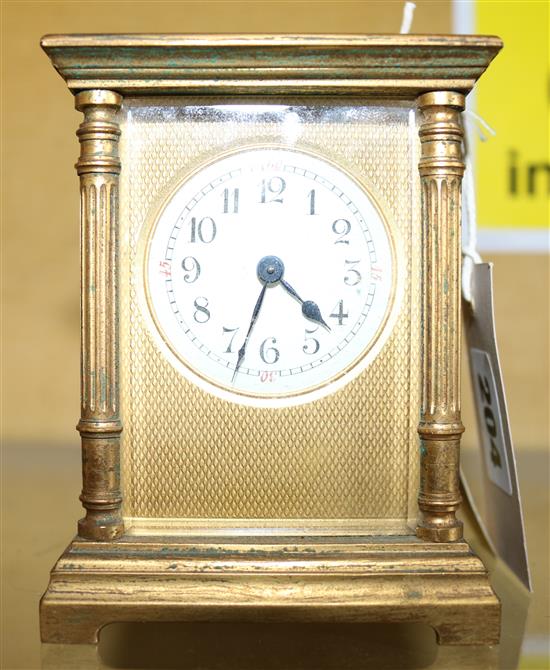 A gilt brass carriage timepiece, arabic dial